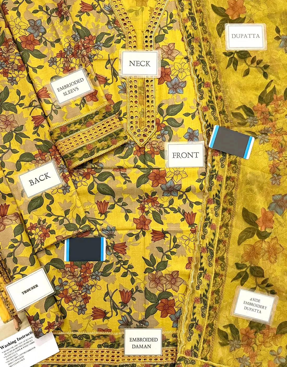 Printed lawn front with heavy embroidered schiffli & spangle work neckline with embroidered schiffli & spangle work daman border, Printed lawn back